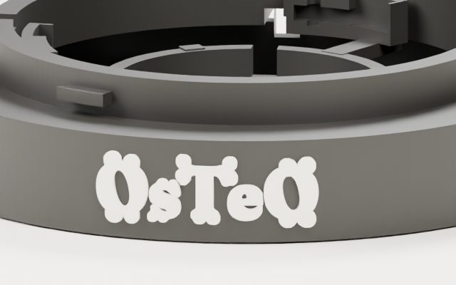Close-up of the OsTeO wordmark raised on the curved front of the base